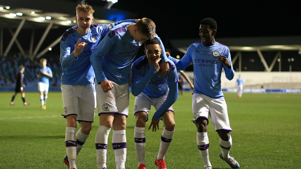 SQUAD GOALS: The City players celebrate after Sam Edozie's opener against Stoke