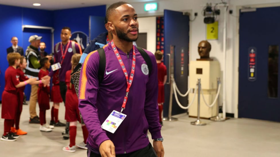 UP FOR THE CUP : Raheem Sterling makes his way to the City dressing room after the squad's Wembley arrival