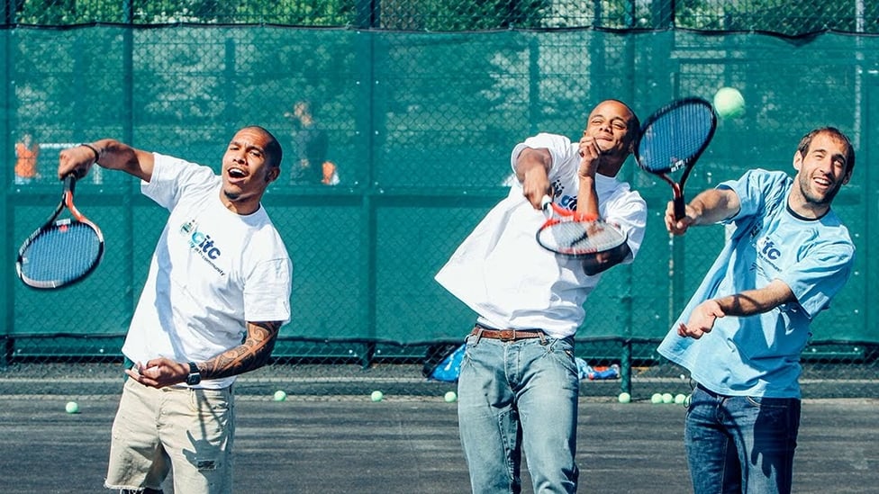 TIME FOR TENNIS : Kompany tests out his forehand.